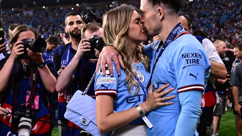 A Captivating Photo Collection: Intimate embraces shared by Man City stars and their partners, celebrating their Champions League triumph